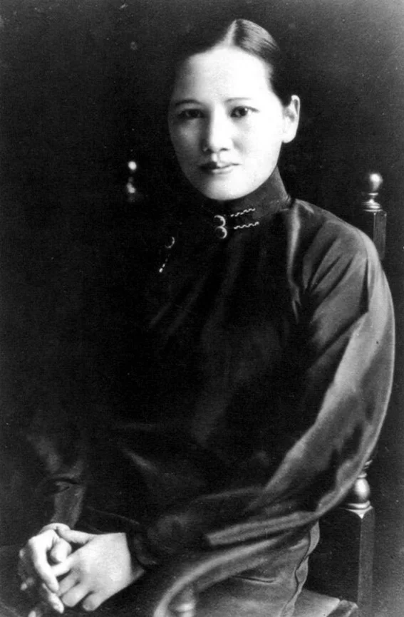 Black and white photograph of a woman. 