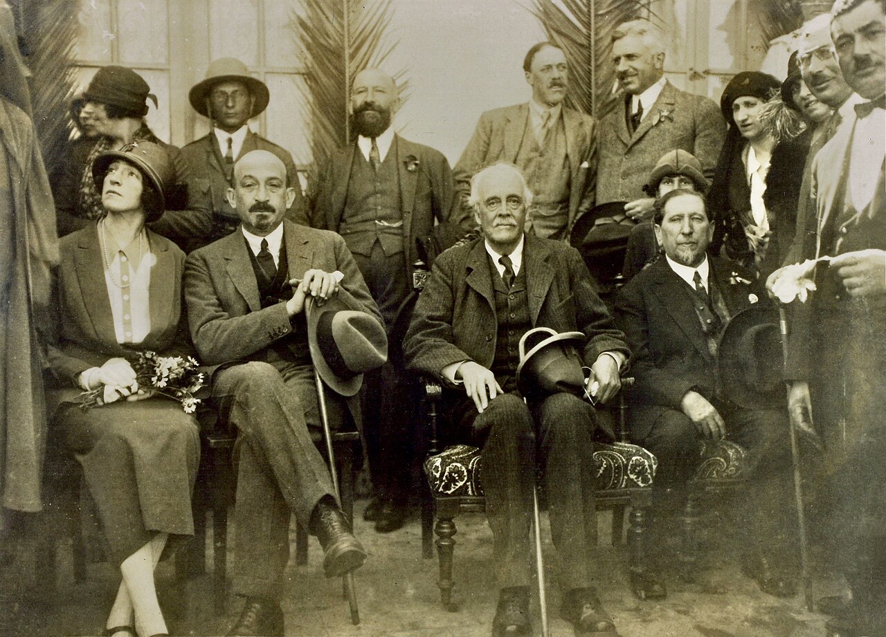 Image of Balfour seated among Jewish community leaders during his 1925 visit to Palestine.